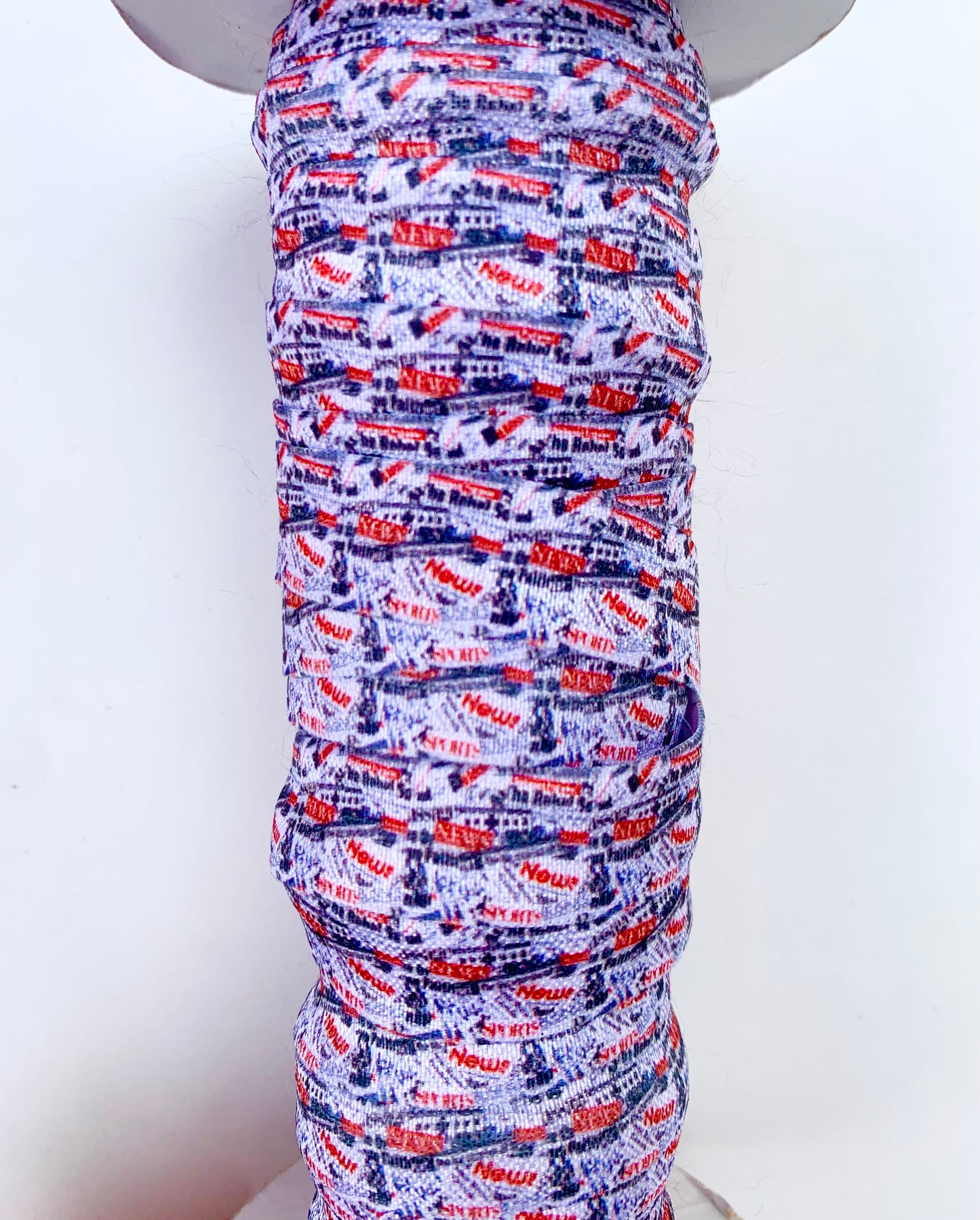 Newspaper Fold Over Elastic